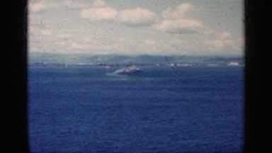 1962: video of boat floating and leaving mark on the large blue sea CUBA
