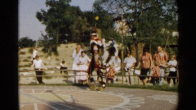 1959: native american braves exhibit their customary attire and dance.