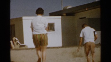 1959: a young boy and his mother returning back to their cottage after a walk on