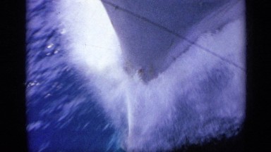 1962: a ship is moving of very past at the ocean and lifted in the flight ITALY