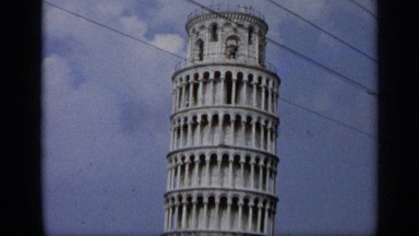 1962: a bright day with sailors in front of the leaning tower of pisa ITALY