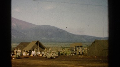 1952: Men Setting Up Tent on Dry Land in Japan