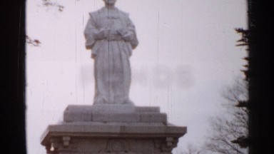 1952: large white statue of a man in a robe JAPAN