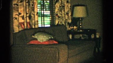 1952: camera pans around a nicely furnished lounge room. JAPAN