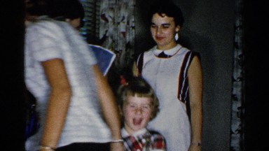 1952: Little Girl Happy and Excited at Indoor Gathering