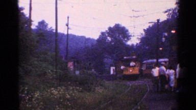 1953: people gathered at the station, waiting on the train to arrive