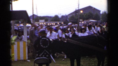 1953: full of people's crowd and bull cart is standing JAPAN
