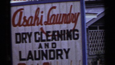 1953: cleaning and laundry shop with tiled roof, walls made of wooden planks