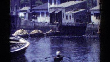 1953: men working by the water and views at the shipping yard JAPAN