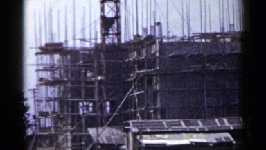 1953: near industry,there was a construction work doing during morning JAPAN