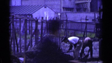 1953: people digging and shoveling up dirt. JAPAN