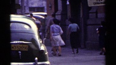 1953: the people are walking fastly nearer to the roadside JAPAN