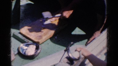 1955: Two Kids in One Boat and a Man Repairing His Boat in California
