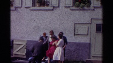 1961: family poses jokingly on a motorcycle and sidecar. GERMANY