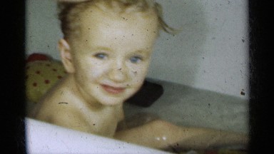 1939: Mother Bathing Her Child and Applying Shampoo in Vintage Home Movie