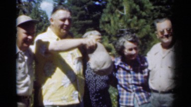 1949: group of peoples are walking together and indicate something