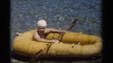1949: little girl paddling in an inflatable raft NEW ORLEANS LOUSIANA