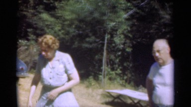 1949: grandparents are standing in the forest SANTA CRUZ CALIFORNIA