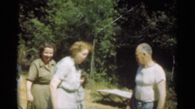 1949: the family members are moving outside of their home SANTA CRUZ CALIFORNIA