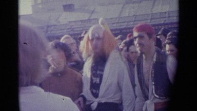 1961: Group of People Disguised Dancing and Having Fun at a Festival in Spain