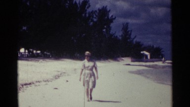 1963: a leisurely stroll on the beach NASSAU BAHAMAS