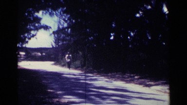 1963: A Person Cycling Through Nassau, Bahamas
