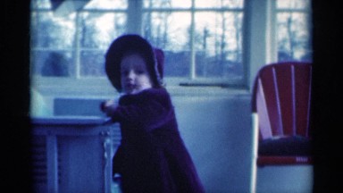 1939: kid playing and enjoying in her home MICHIGAN