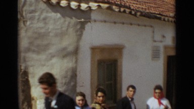 1965: People Standing on Road Near Building in Nazaré, Portugal