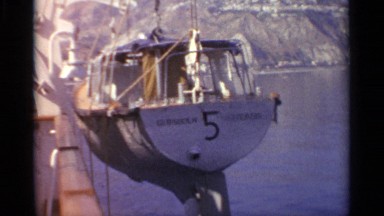 1965: Lifeboat Hangs Over Side of Large Ship in Sicily