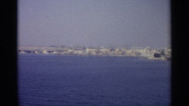1965: someone travelling on the ocean nearer to the city SICILY