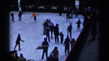 1955: people skating around in circles on an ice skating rink NEW YORK CITY