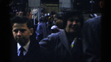 1955: a crowded street with lot of people belonging to different age groups