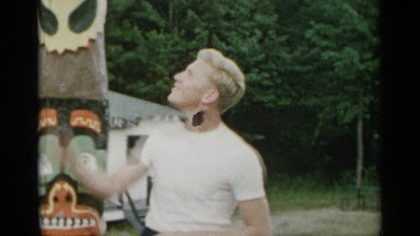 1954: a person is standing near post NEW YORK