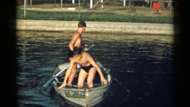 1954: people are standing in a boat NEW YORK