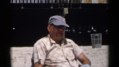 1954: a person with cap in his head sitting in the sun getting sweated NEW YORK