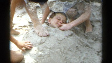 1954: child sand bath NEW YORK