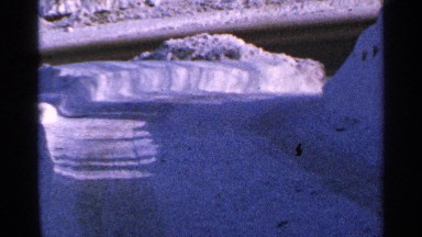 1965: a snow path located alone no one is walking on the road at the morning