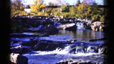 1960: A Beautiful Waterfall Flowing Peacefully Under an Overpass Sioux Falls