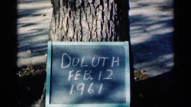 1961: Man Walking in Snow Field Carefully Due to Slippery Conditions