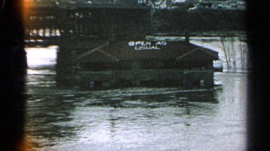 1965: the flood is surround the building full of huge water it is a natural