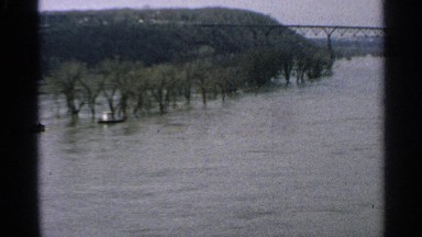 1965: the river heavy fast in flood in one place to another place