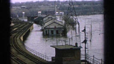 1965: a bridge near a flooded river on a cloudy day, followed by a calm river