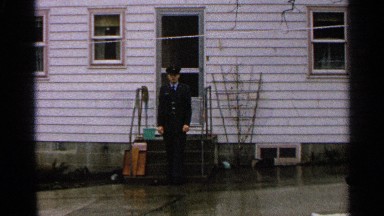 1965: a man walks in a straight path down the stairs while looking handsome