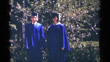 1964: a man and woman complete the degree collect the convocation certificate
