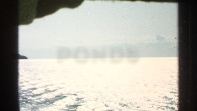1964: on the sea, with still water and sunlight reflecting from sea WASHINGTON