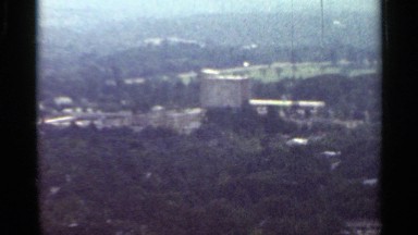 1965: three types of buildings shown in the picture surrounded by dark grown