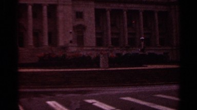 1965: a dome top building with orange flowers around it. ARKANSAS