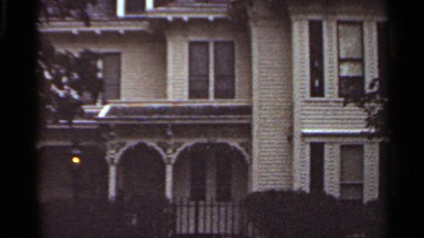 1965: two building view in the low angle one light yellow building