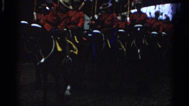 1965: cavalry men wearing elegant uniform marching along the road SAINT LOUIS
