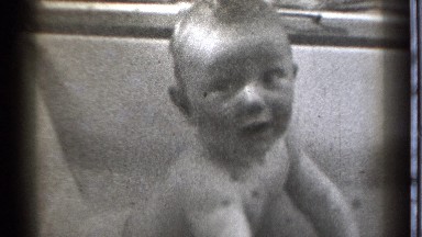 1939: A Baby Played in the Water Tub with Half-Level Water